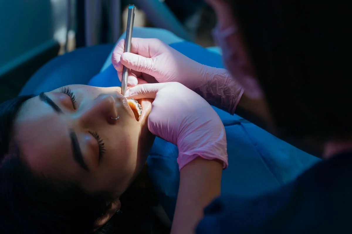 Representative photograph of a dentist providing clinical care